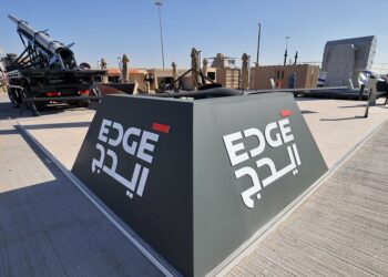 This picture taken on November 14, 2021 shows a view of the logo of EDGE advanced technology group for defence at the 2021 Dubai Airshow in the Gulf emirate. (Photo by Giuseppe CACACE / AFP)