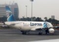 An EgyptAir A320-200 plane is pictured through the window of an Etihad Airways plane after it landed on the runway at Cairo International Airport, Egypt December 16, 2017. Picture taken December 16, 2017. REUTERS/Amr Abdallah Dalsh - RC140A9C9210